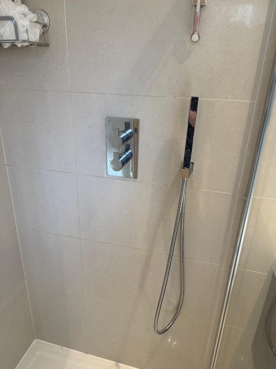 Thermostatic shower cartridge repair and completed shower controls